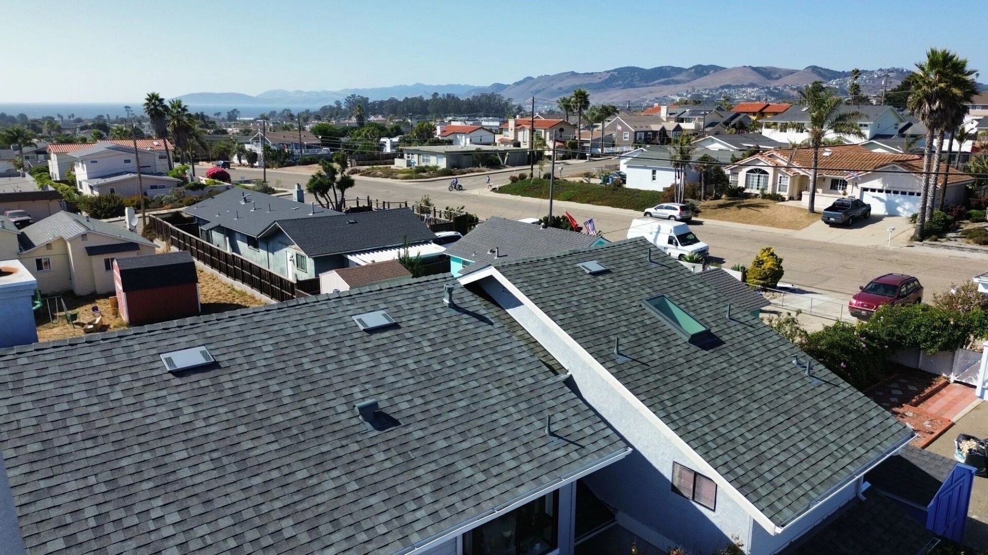 Aerial view of suburban neighborhood rooftops.